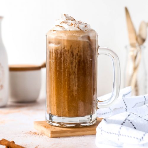 pumpkin spice latte with cinnamon whipped cream