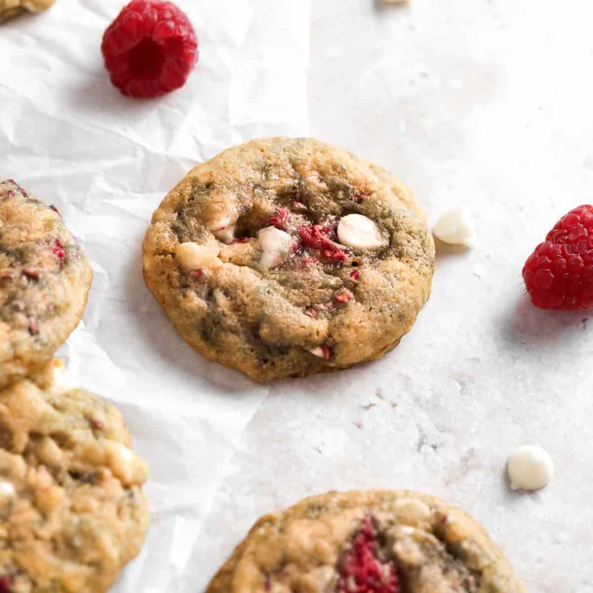 a raspberry white chocolate cookie on parchment paper