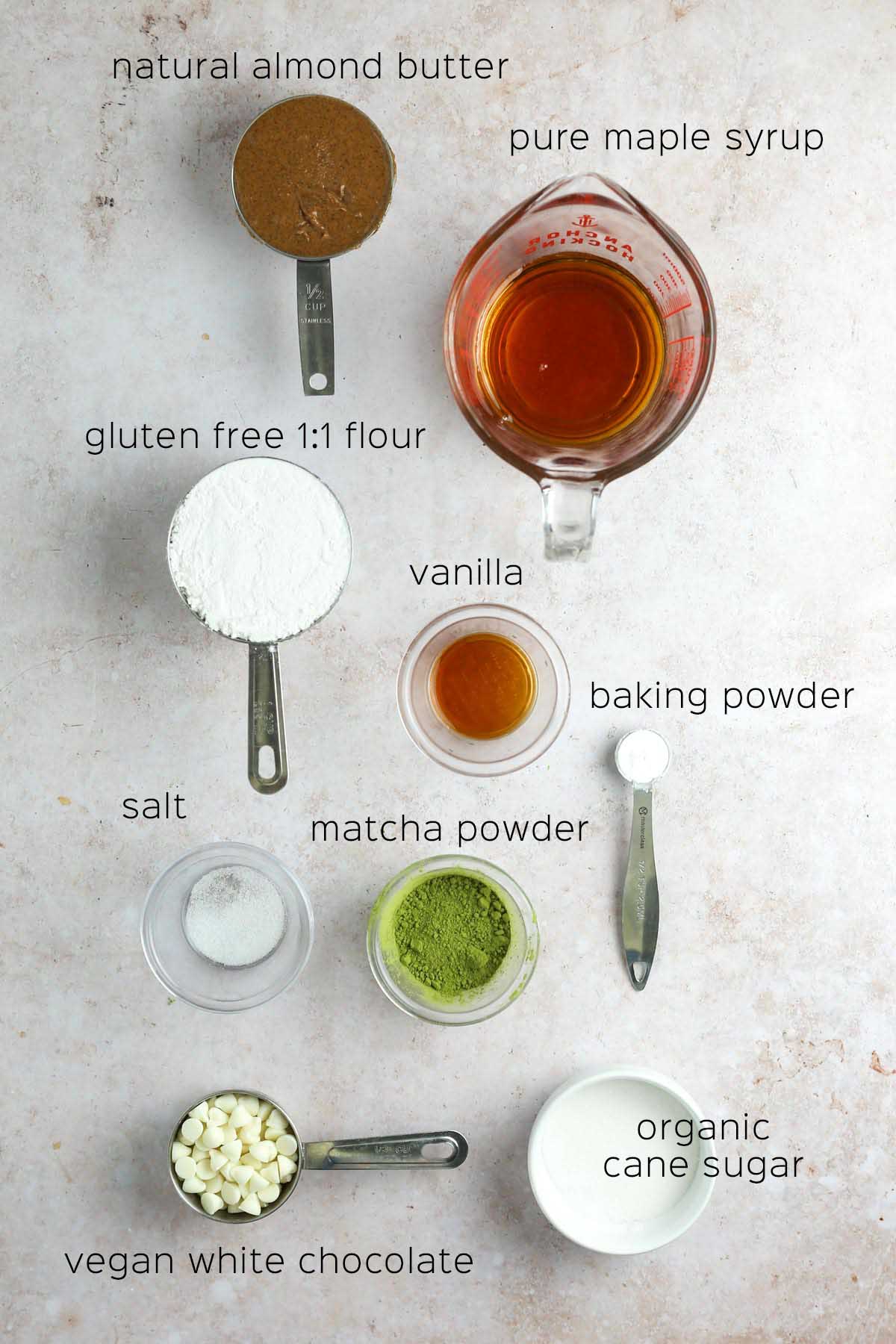 all ingredients to make the cookies shown in individual bowls on a table.